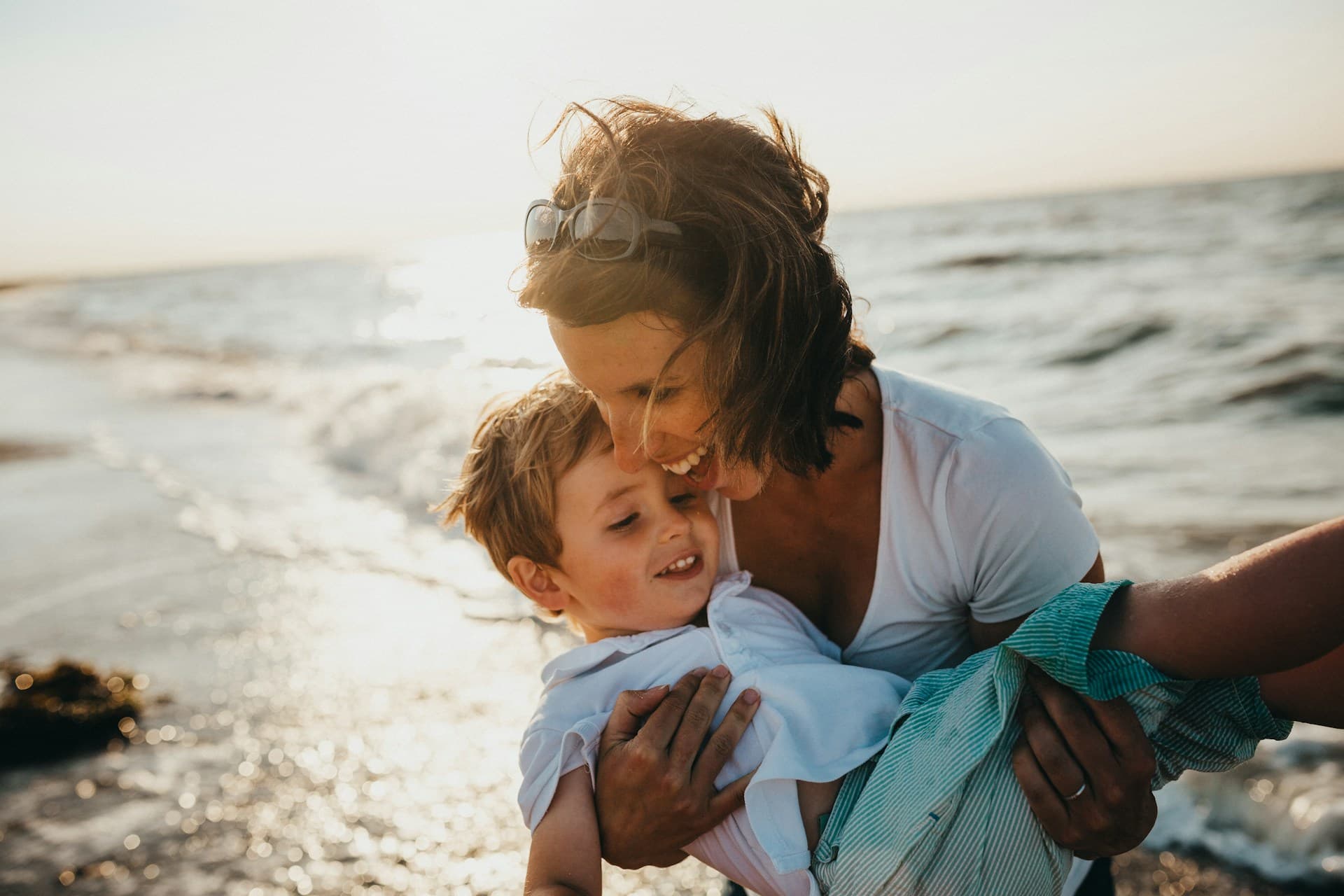 A warm moment between a parent and a young child
